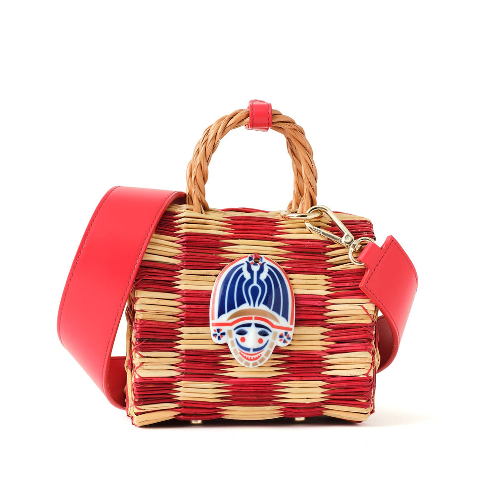 Woven handbag with red frame and handle on a white background
