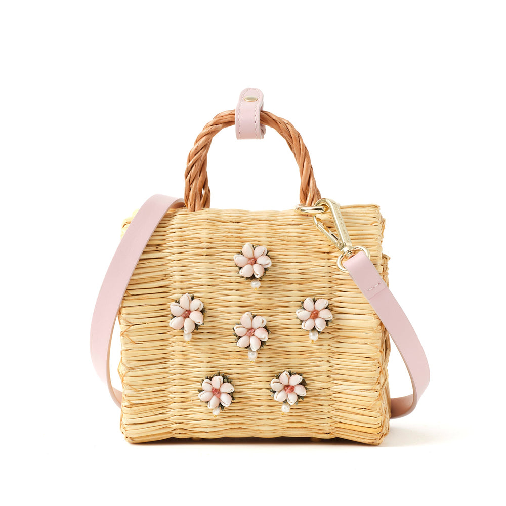 Shella Vallentines Pink limited edition basket bag by Heimat Atlantica, woven in Portugal and finished in Spain with a blush pink Atlantic shell centerpiece.