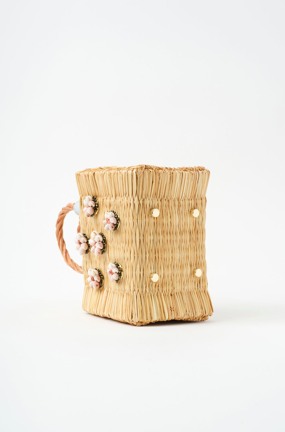 Shella Sky Atlantic Ice basket bag by Heimat Atlantica, handwoven in Portugal and finished in Spain with a pink Atlantic shell and hand embroidery golden feet detail