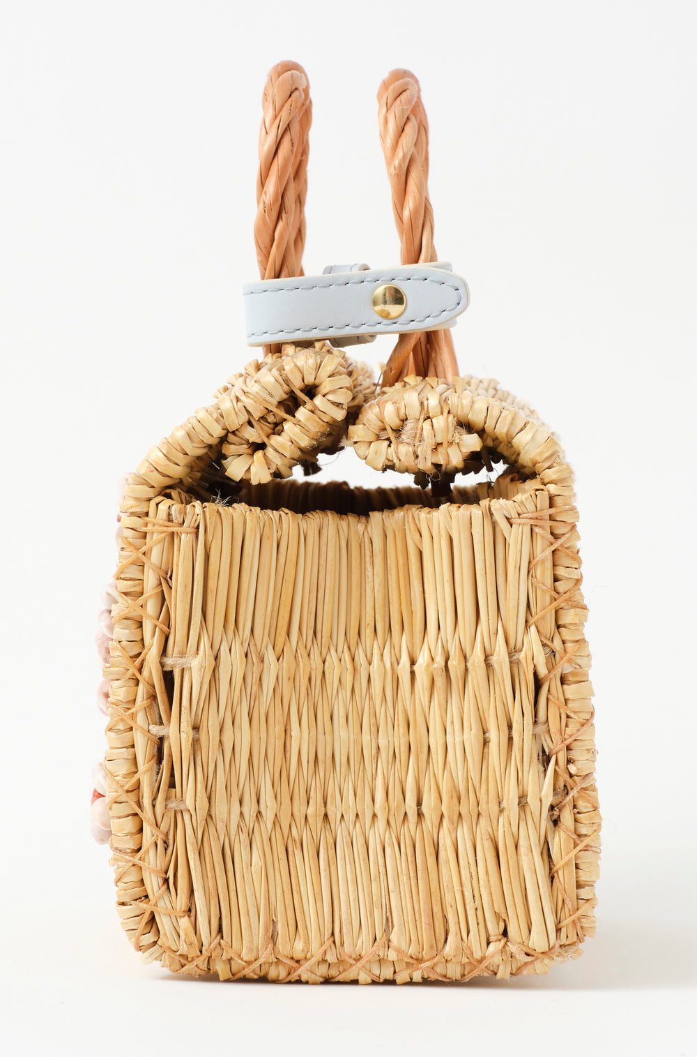 Shella Sky Atlantic Ice basket bag by Heimat Atlantica, handwoven in Portugal and finished in Spain with a pink Atlantic shell and hand embroidery.