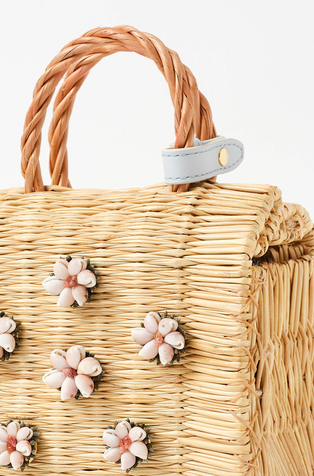 Shella Sky Atlantic Ice basket bag by Heimat Atlantica, handwoven in Portugal and finished in Spain with a pink Atlantic shell and hand  closure detail
