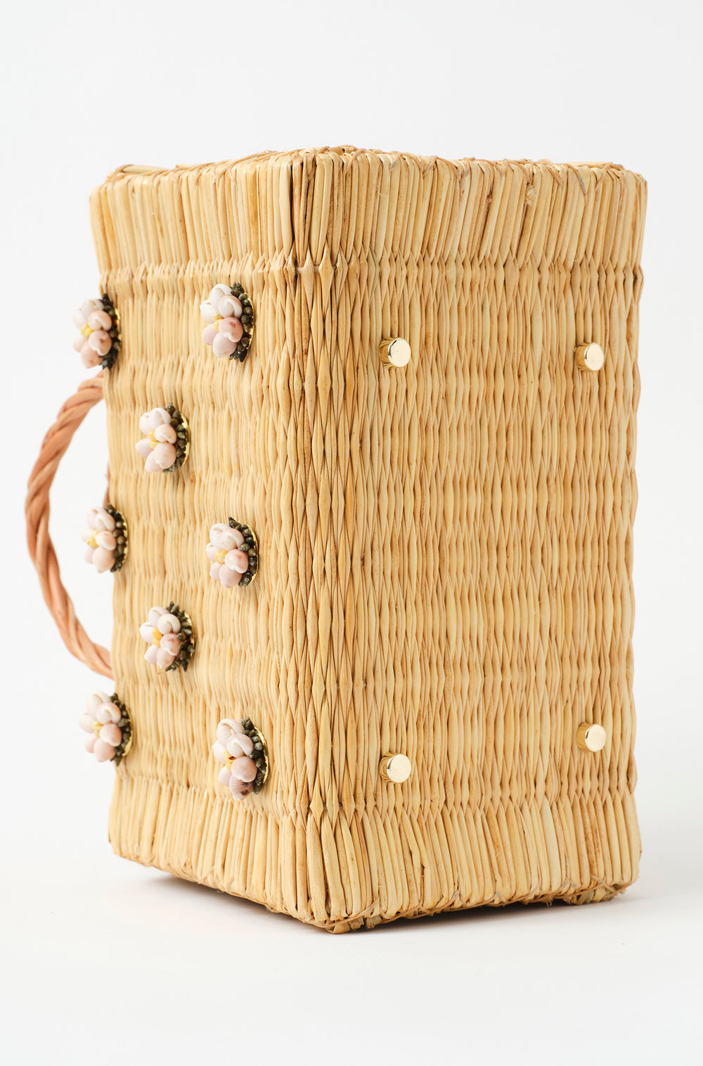 Shella Medium White basket bag by Heimat Atlantica, handwoven in Portugal from reed and finished in Spain with an Atlantic shell charm. Golden feet detail. 