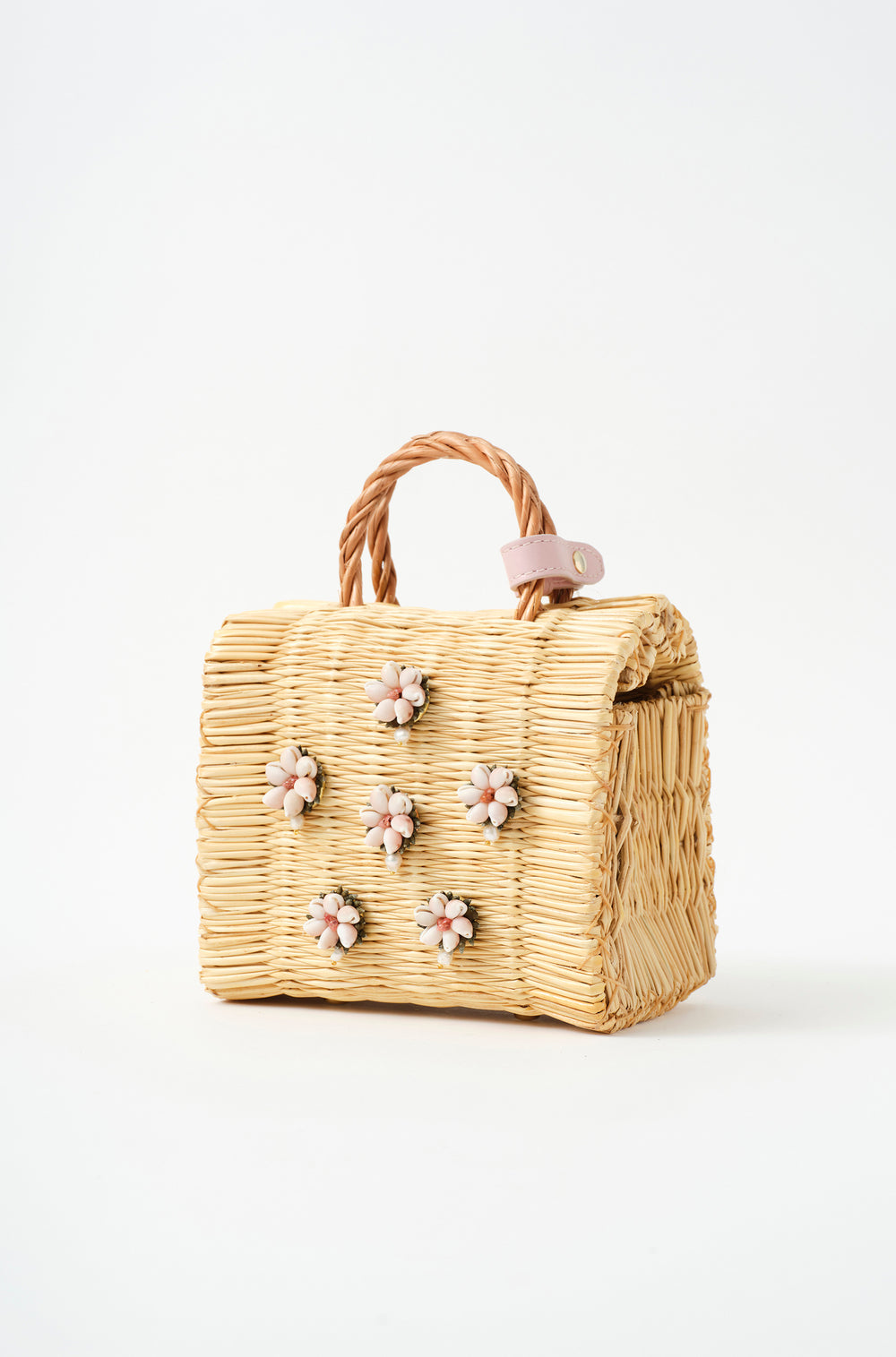 Shella Vallentines Pink limited edition basket bag by Heimat Atlantica, woven in Portugal and finished in Spain with a blush pink Atlantic shell centerpiece.