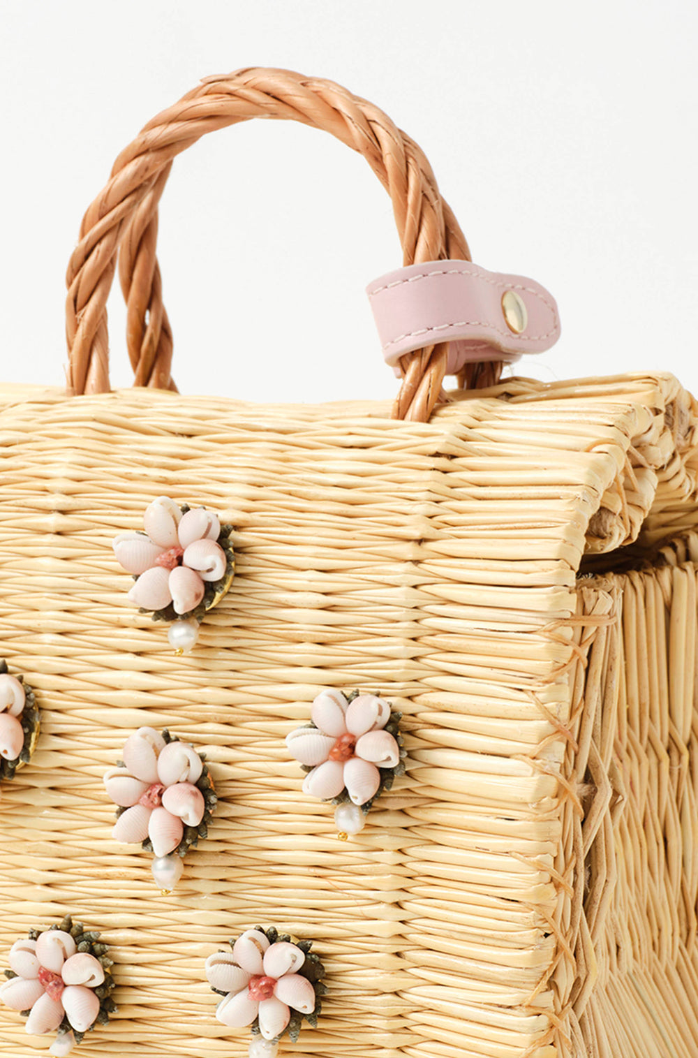 Shella Vallentines Pink limited edition basket bag by Heimat Atlantica, woven in Portugal and finished in Spain with a blush pink Atlantic shell centerpiece.