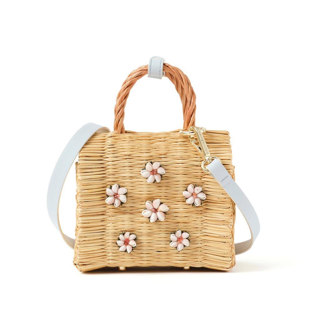 Shella Sky Atlantic Ice basket bag by Heimat Atlantica, handwoven in Portugal and finished in Spain with a pink Atlantic shell and hand embroidery.